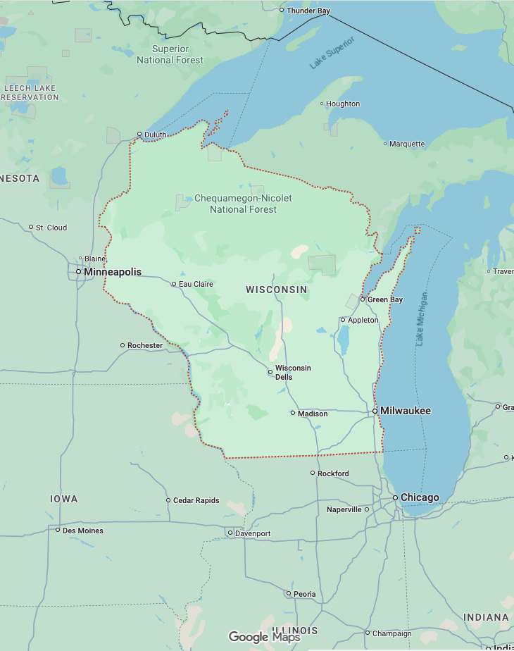 Hombre limpiando una puerta de vidrio, representando un servicio de limpieza de puertas.